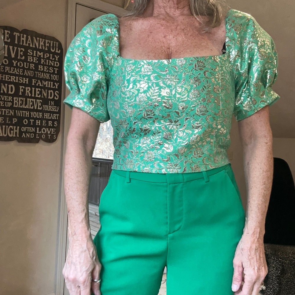 Alice + Olivia green and silver foil puff sleeve party top.